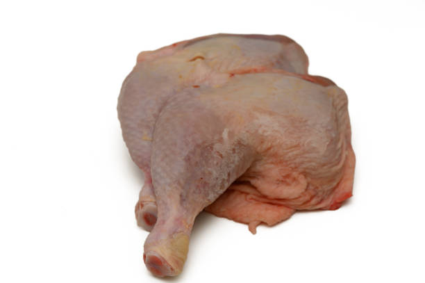 istock Fresh chicken legs ready for cooking in a modern kitchen setting 2203756403