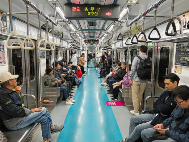 Seoul, Korea - October 19, 2024: Korean commuters commuting in the subway system of Seoul, South Korea.
