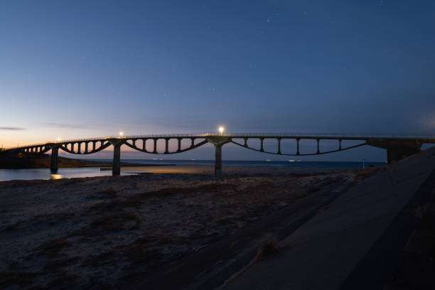 Beautiful sky and silhouette of a bridge before dawn