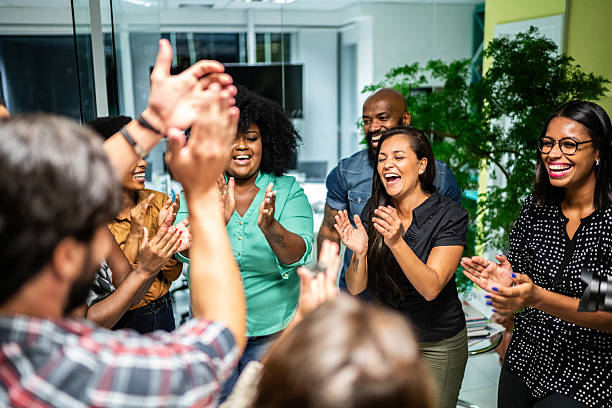 istock Successful business team celebrating in the office 2203764957