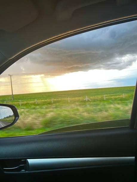 istock BEAUTIFUL RAIN CLOUD ON FARM LANDSCAPE SUNSET 2203766940