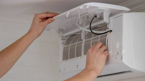 istock Cleaning Air Conditioner Filter for Better Air Quality 2203767589