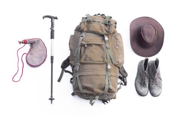 istock vintage mountain canvas travel backpack and accessories isolated on white background 2203770502