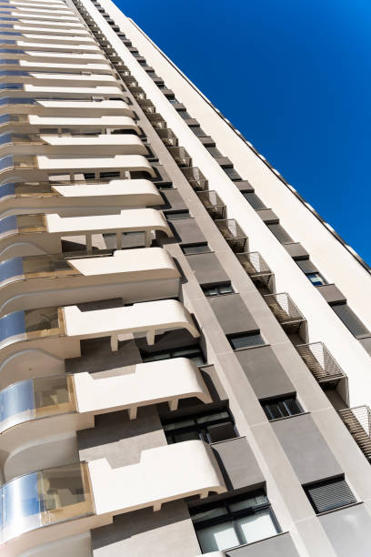 istock Modern hotel building reaching for the clear blue sky 2203771963