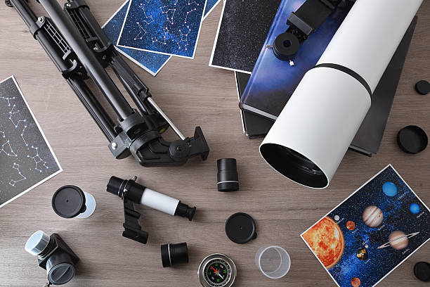 istock Tools and material as hobby of astronomy with telescope top 2203777227