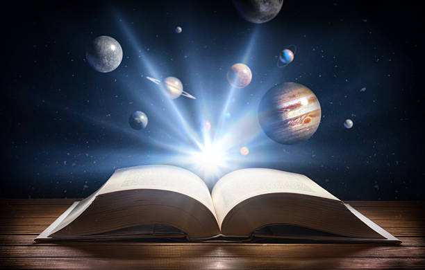 istock Concept of knowledge of universe with book planets and universe 2203777246
