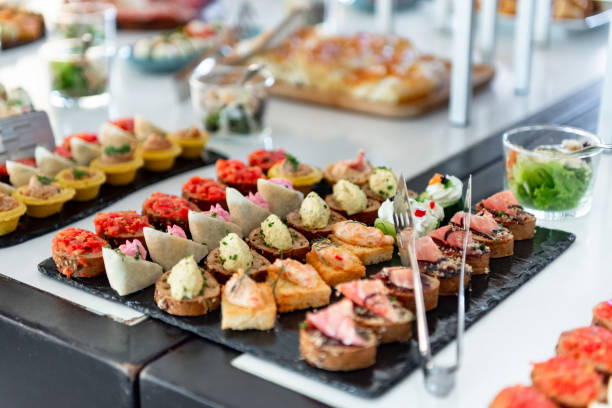 istock Delightful gourmet canapes spread at a vibrant culinary event 2203778549