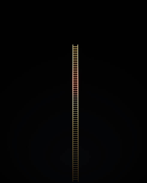 Gold colored ladder on black background. Vertical composition.