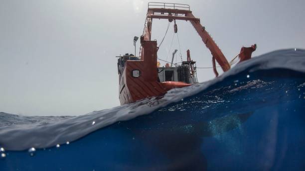 istock A research vessel floats over the deep blue ocean 2203789313