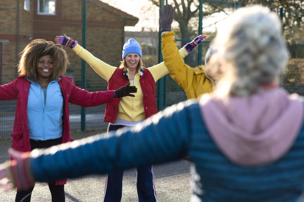 istock Women Enjoying a Group Warmup 2203789896
