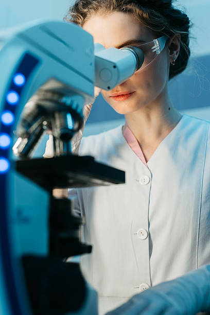 istock A young woman works in a modern laboratory with advanced equipment and an analyzer. 2203791338