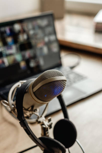 istock Microphone on the air with filter for video conference calling on laptop computer 2203791815