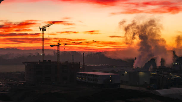 A silhouette of a power plant in Wilhelmhaven at sunset.