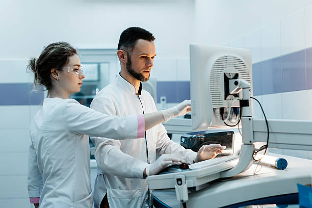 istock A group of scientists conducts biochemical research in a modern laboratory. 2203793484