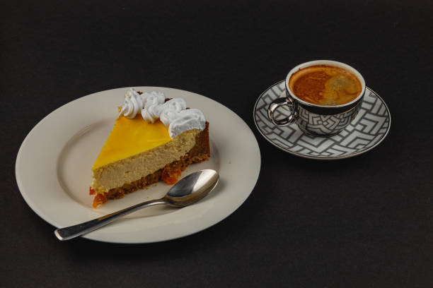 istock Delightful dessert plate featuring creamy cheesecake and espresso beverage 2203794201