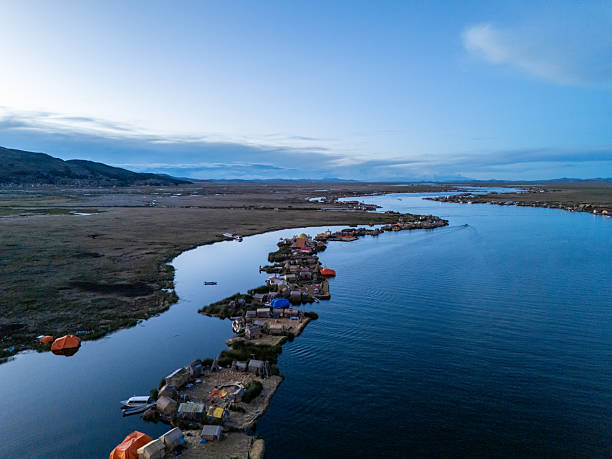 istock Remote Lakeside Village at Dusk with Scenic Mountain Views 2203799494