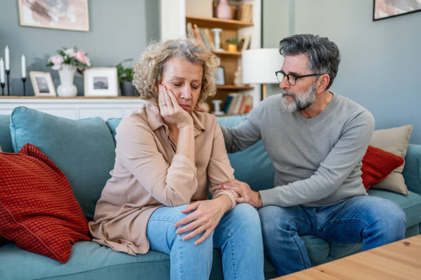 istock Man comforting his wife 2203800225