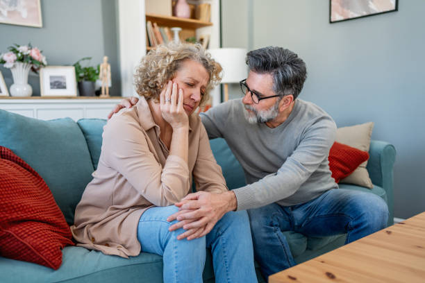 istock Man comforting his wife 2203800264