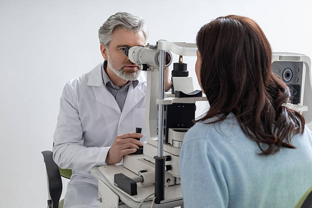 istock Woman visiting optometry center for lens examination with oculist 2203801364