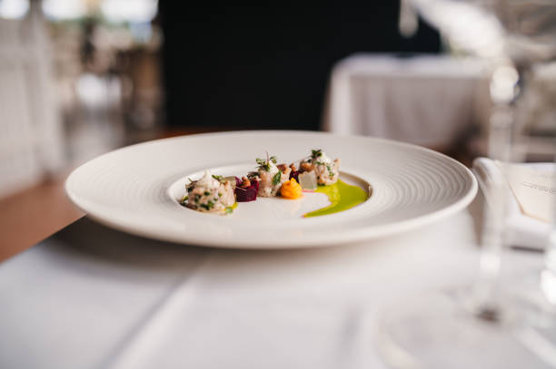 istock Carp, apples and herbs on a plate 2203806998