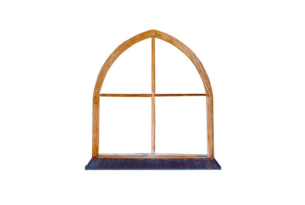Wooden arched window frame isolated on a white background,  frame has a classic gothic-style design with four sections and a weathered wooden texture, architectural, design, and restoration project
