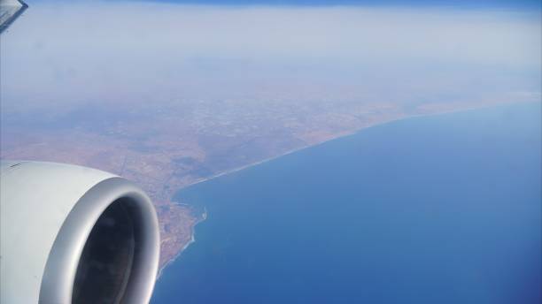 istock Airplane engine flying over Morocco coastline and Atlantic Ocean 2203812754
