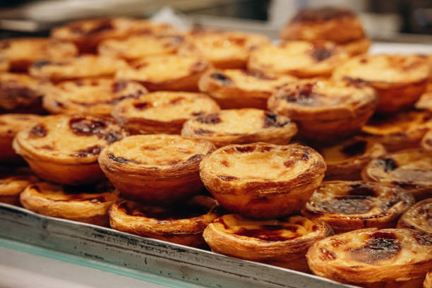 istock Traditional Portuguese dessert pasteis de nata, served fresh in Lisbon 2203816381