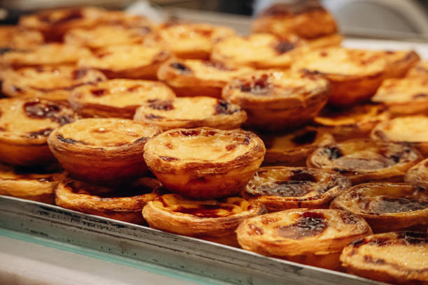 istock Traditional Portuguese dessert pasteis de nata, served fresh in Lisbon 2203816408