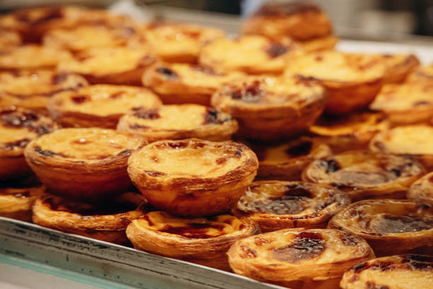 istock Traditional Portuguese dessert pasteis de nata, served fresh in Lisbon 2203816516