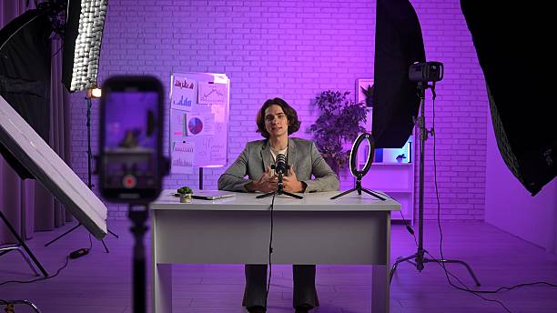 istock Engaging Digital Storytelling in a Modern Podcast Studio Environment With an Expert Influencer 2203818487