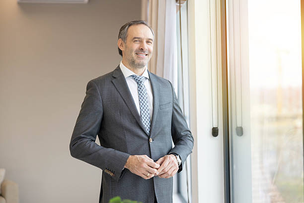 istock Confident Man in Business Suit Standing 2203822971