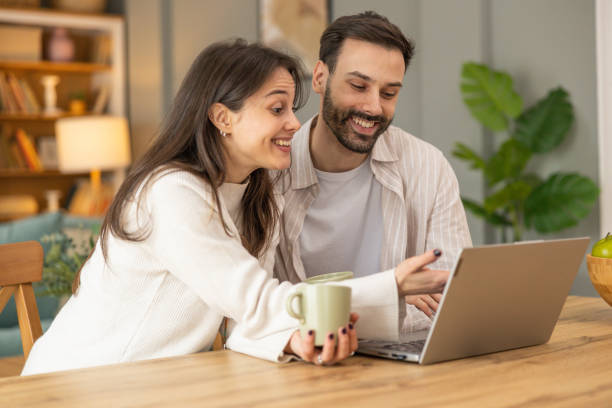 istock Couple sharing a moment at the desk 2203828733