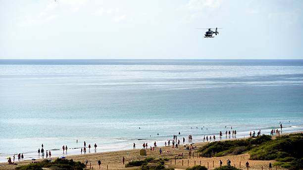 istock Helicopter flying over Maspalomas beach in Gran Canaria, Canary Islands 2203828800