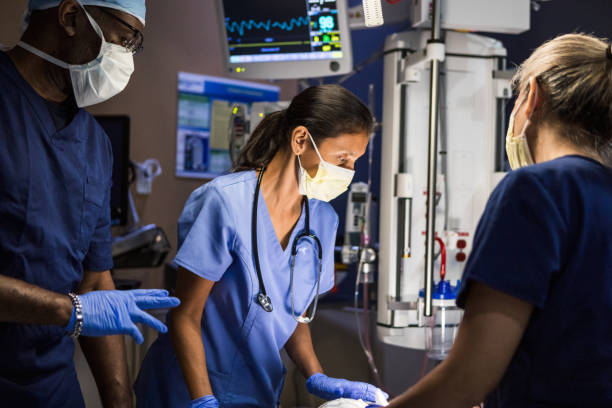 istock Teamwork in Healthcare: Doctors and Nurses Collaborating 2203831505