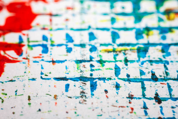 Extreme close up of colorful acrylic paint texture showing brush strokes. Selective focus.