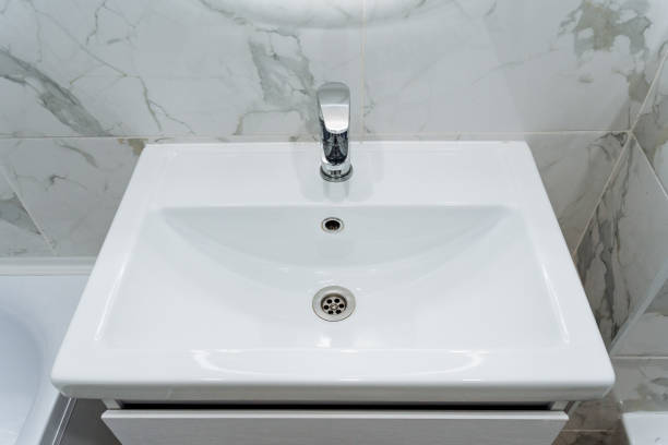 istock There is a bathroom sink that features a faucet installed on top of it 2203838356