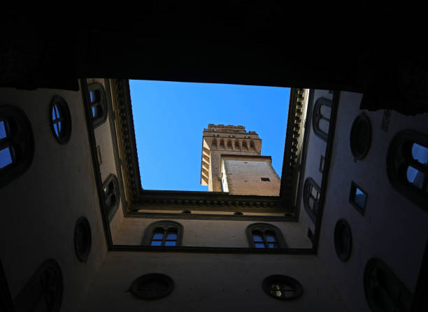 Florence, FI, Italy - March 3, 2025: Internal courtyard and tower of PALAZZO VECCHIO that means OLD Palace