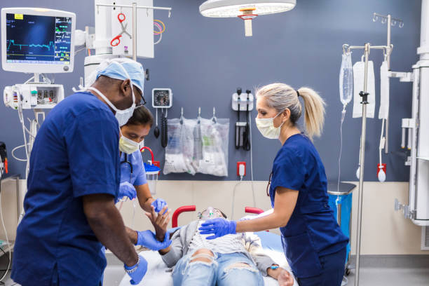 istock Emergency Room Teamwork: Doctors and Nurses Providing Critical Care 2203842345