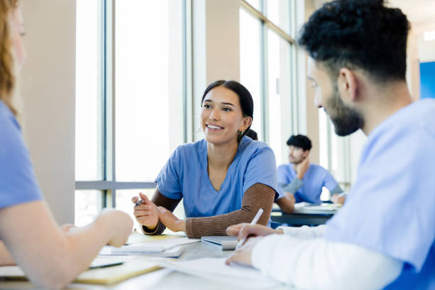 istock Group of Diverse Medical Students Studying Together in Classroom 2203846285