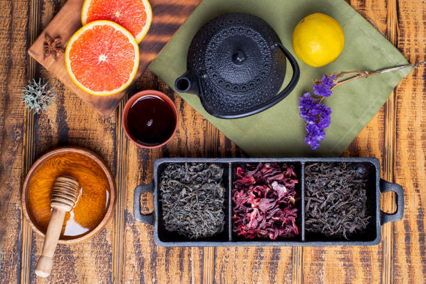 istock tea on a wooden table with ginger and honey 2203848433
