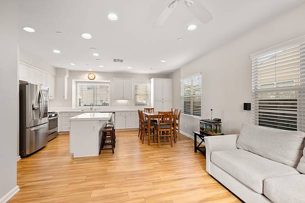 istock Spacious Kitchen with White Cabinetry and Island 2203849799