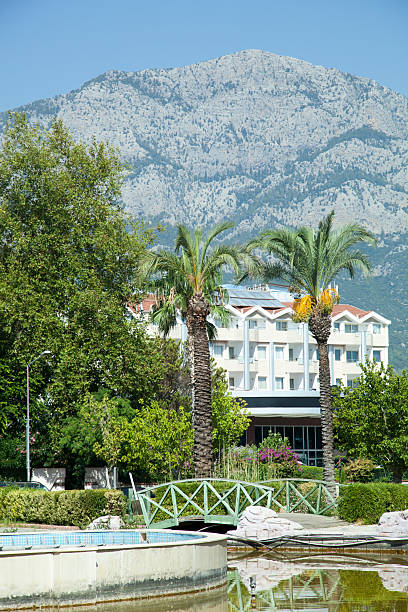 istock Kemer Resort Town Park And A Mountain 2203853337