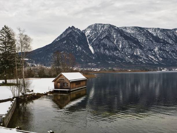 istock Winter Boathouse by Snowy Mountains 2203855813