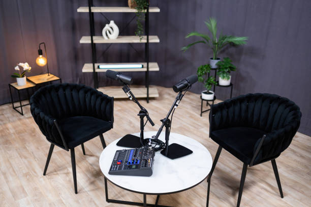 istock Podcast studio setup with microphones and mixer ready for recording 2203861385