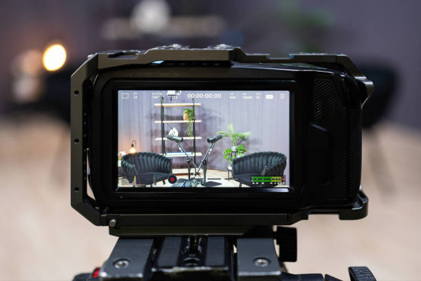 istock Professional video camera recording podcast in modern studio 2203861411