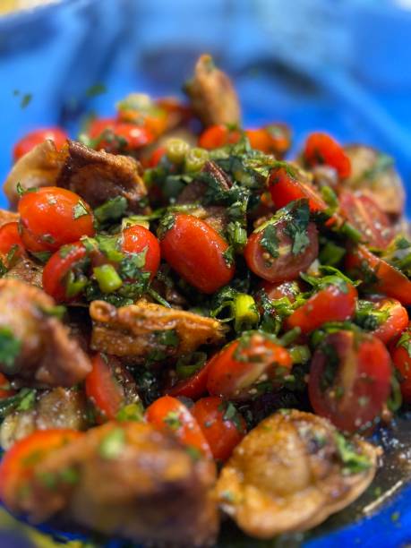 istock Cherry tomatoes with Seared Mushrooms, green onions and cilantro. 2203867309