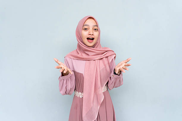 istock Surprised young Asian Muslim woman 2203871635