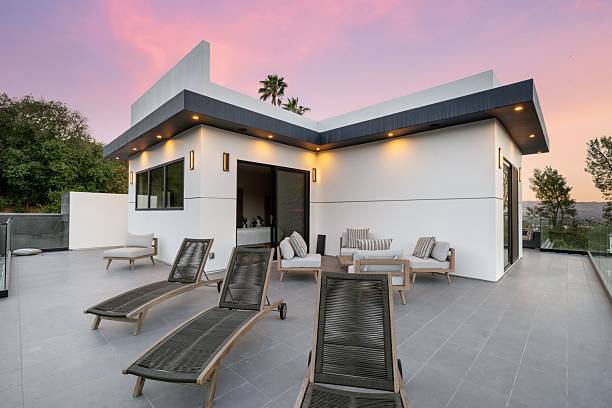 istock Luxury Outdoor Patio with Pool, Stylish Seating, and Sunset Views 2203875596