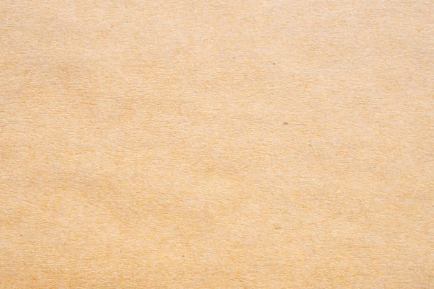 istock Old brown recycle cardboard kraft paper texture background 2203879235