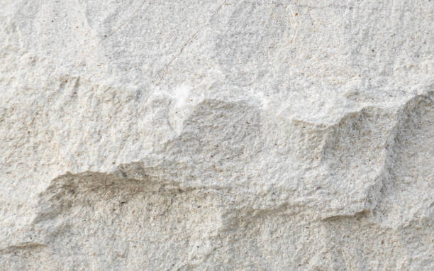 istock [4k] Close-up of White Crushed Stone Texture 2203883957